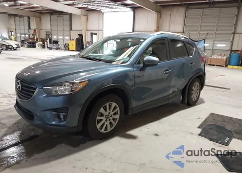 2016 Mazda Cx-5 Touring z USA, uszkodzony, nr VIN JM3KE2CY4G0899910